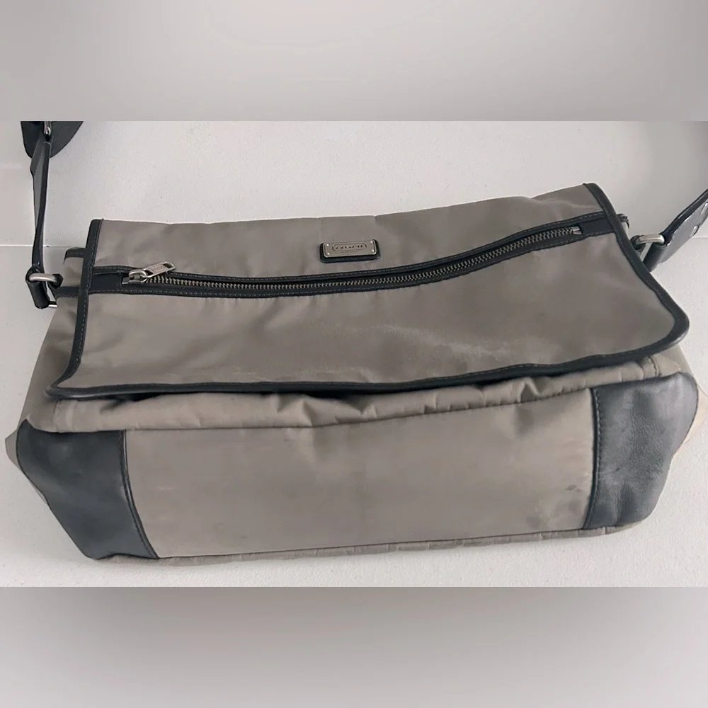 Unisex Coach crossbody messenger bag.